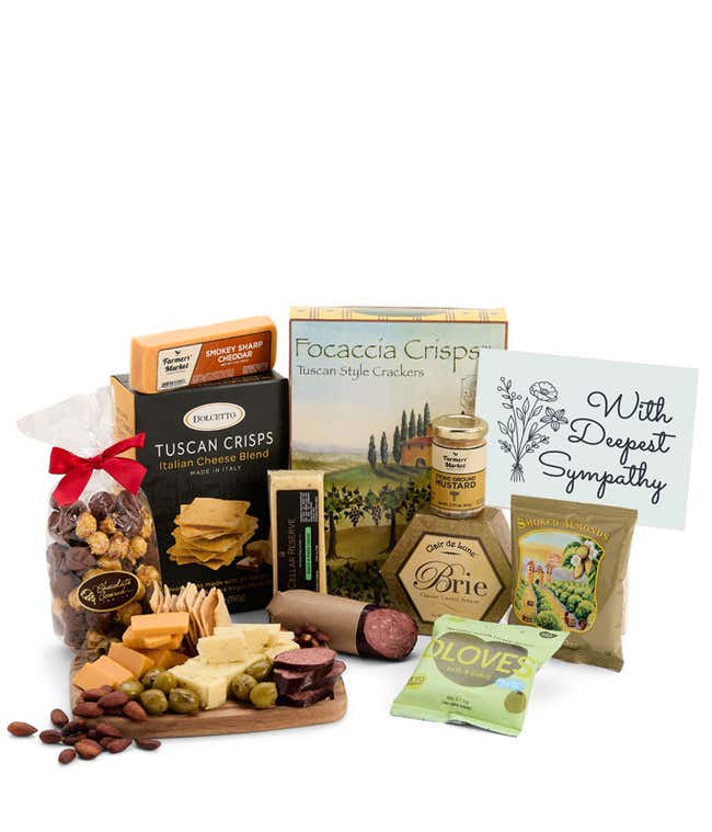 A gourmet charcuterie gift set featuring Tuscan crisps, focaccia crackers, smoked cheddar, brie spread, olives, mustard, sausage, almonds, chocolate-covered popcorn, and finished with a Sympathy card to show your support.