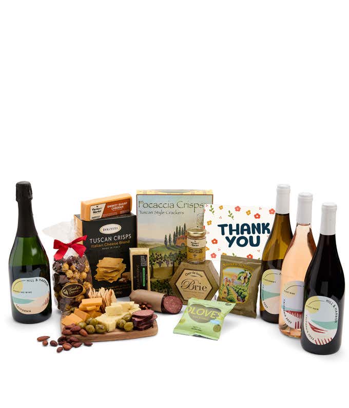 A wine and cheese gift set featuring 4 - bottles of Hill & Harbor wine - sparkling, white, rosé and red. Includes a variety of gourmet cheeses, crackers, olives, summer sausage, almonds, and condiments finished with a Thank You card.